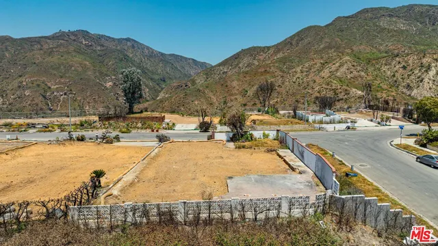 a view of a swimming pool with a mountain