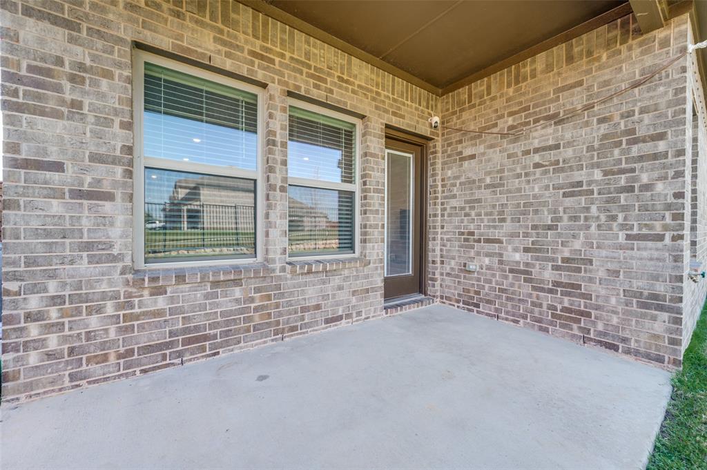 3876 Lyndhurst Avenue Little Elm, TX 75068 - Photo 23 of 25 a view of an entrance of the building