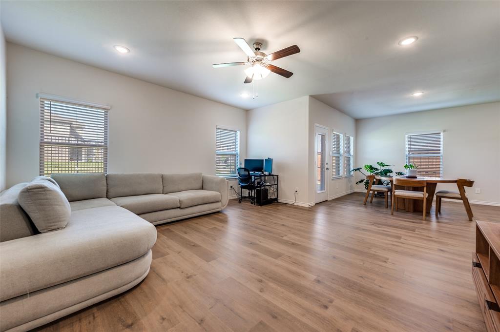 3876 Lyndhurst Avenue Little Elm, TX 75068 - Photo 3 of 25 a living room with furniture and wooden floor