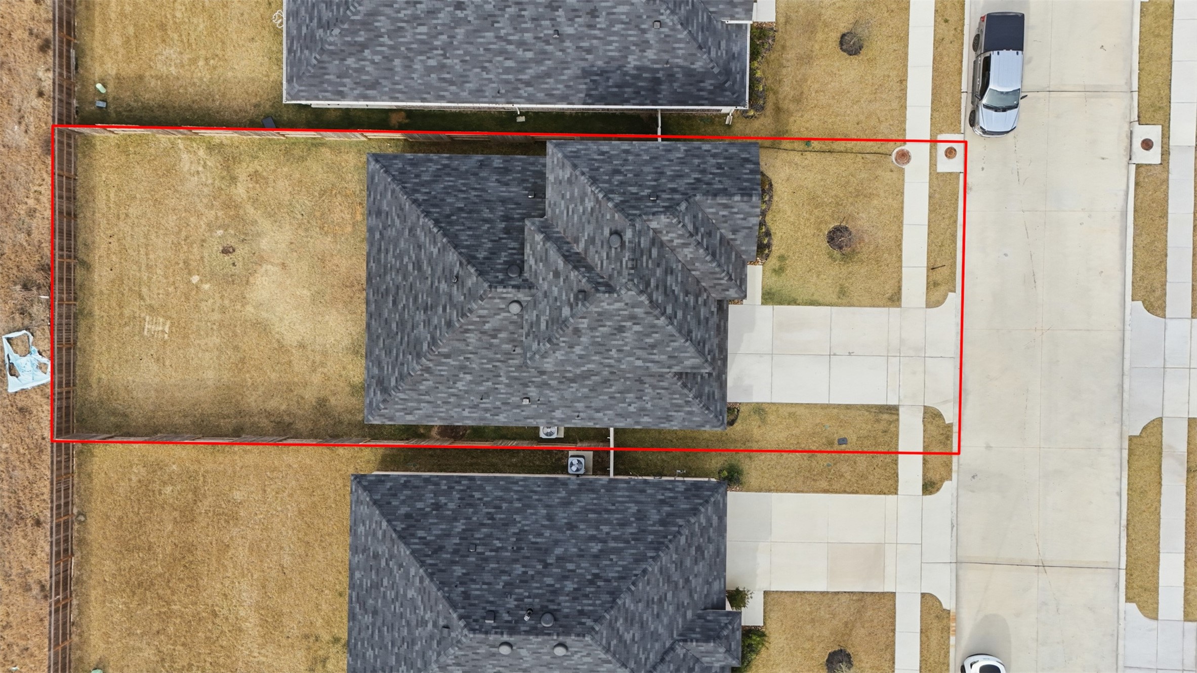 17719 Winfall Drive Crosby, TX 77532 - Photo 2 of 47 This aerial photo shows a well-sized backyard, and a driveway leading to the street.