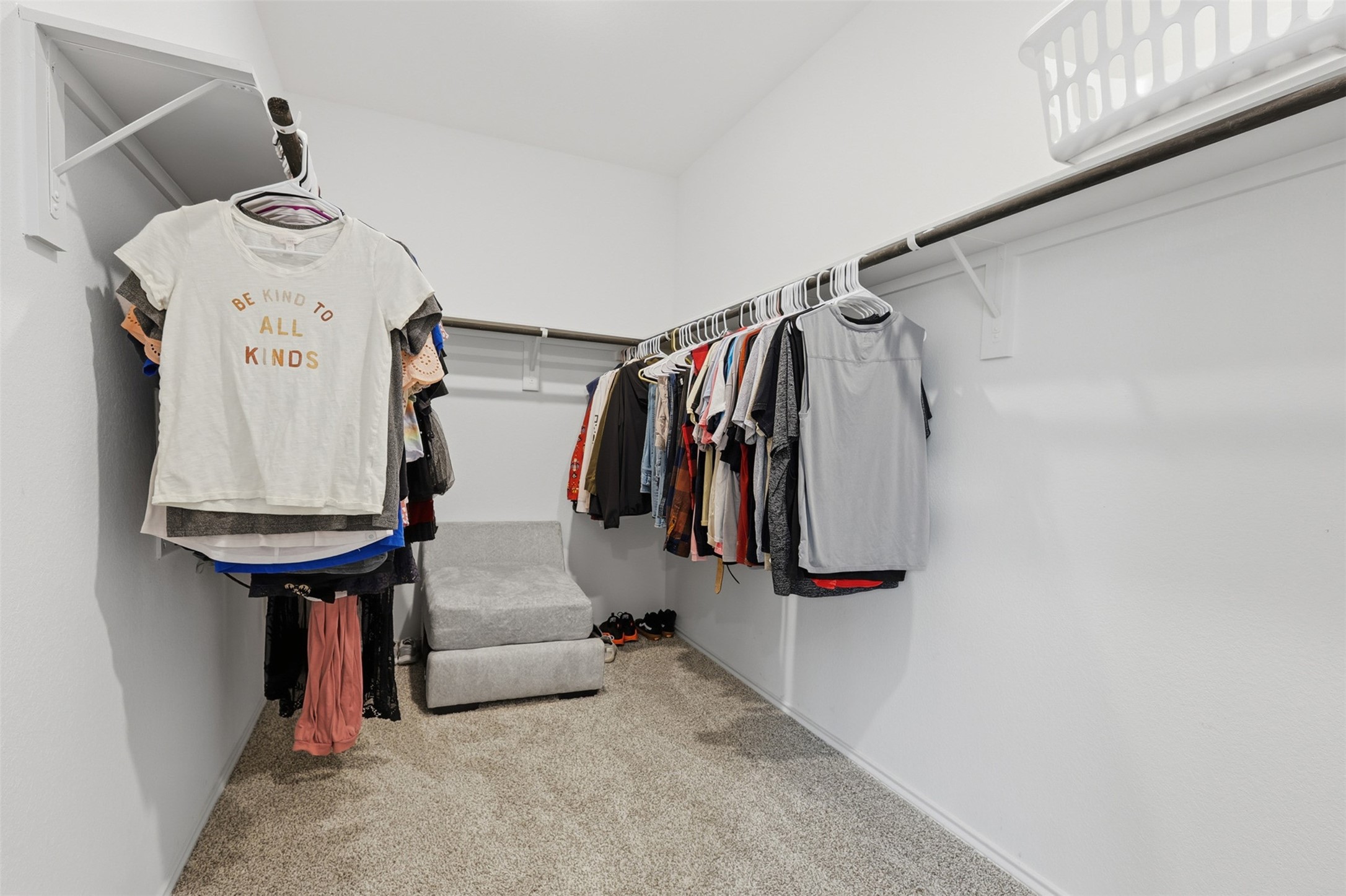 17719 Winfall Drive Crosby, TX 77532 - Photo 26 of 47 Spacious walk-in closet with carpeted flooring, ample hanging space, and bright white walls.