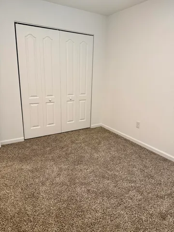 an empty room with a natural light