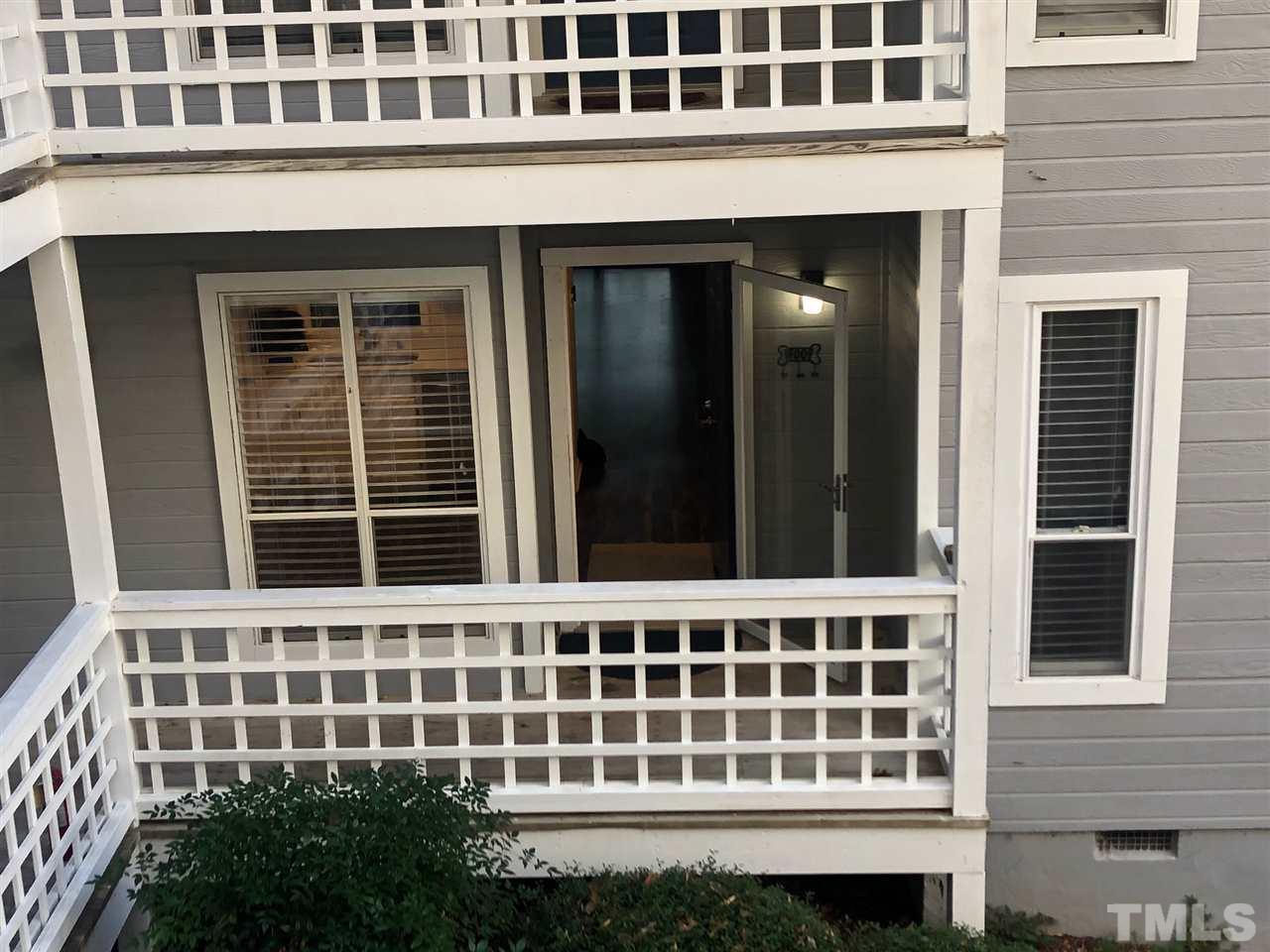 4621 Timbermill Court, Unit 103 Raleigh, NC 27612 - Photo 1 of 13 a view of a building with a window