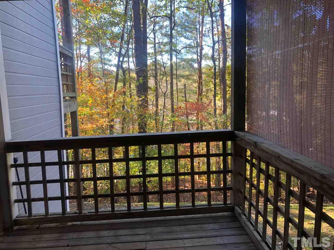 4621 Timbermill Court, Unit 103 Raleigh, NC 27612 - Photo 6 of 13 a view of wooden balcony