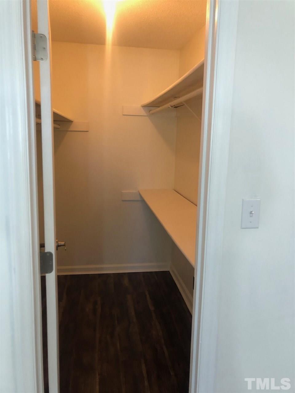 4621 Timbermill Court, Unit 103 Raleigh, NC 27612 - Photo 8 of 13 a view of walk in closet