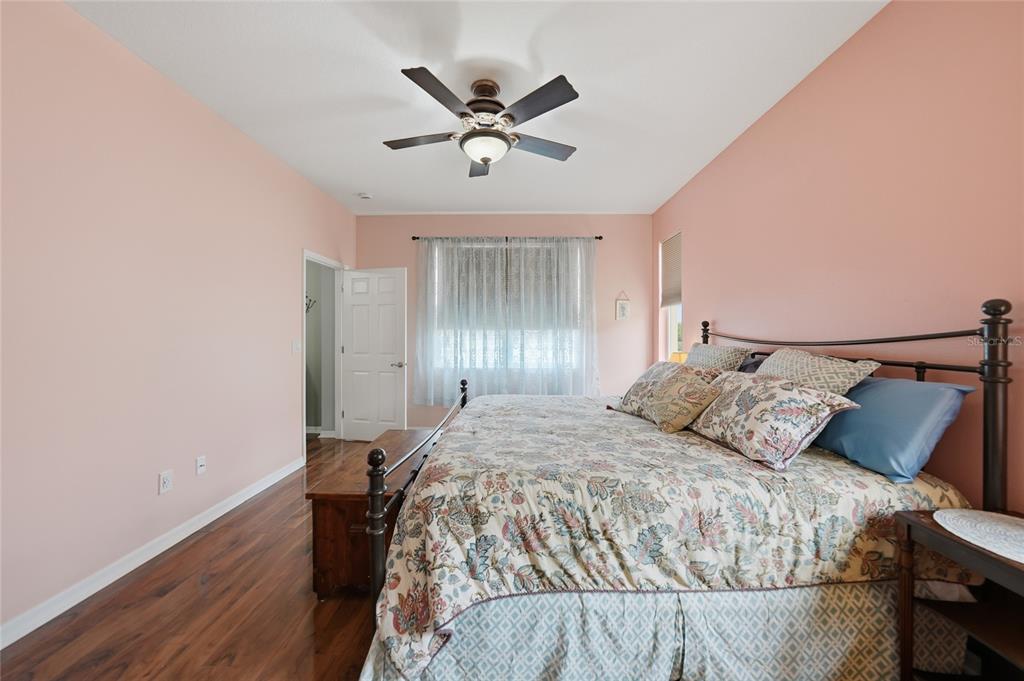 5221 Layton Drive Venice, FL 34293 - Photo 14 of 33 a bedroom with a bed and window