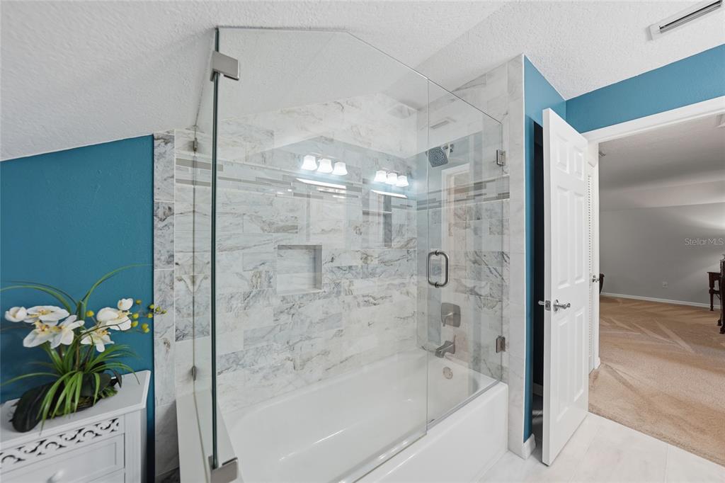 5221 Layton Drive Venice, FL 34293 - Photo 21 of 33 a bathroom with a shower