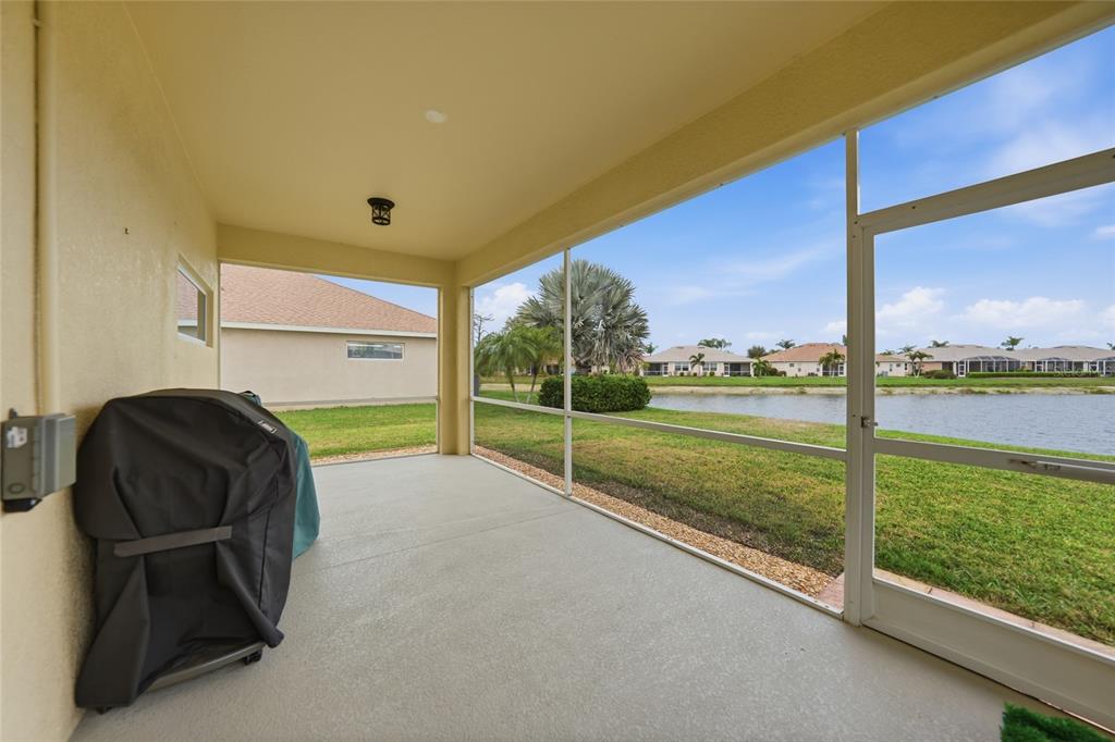 5221 Layton Drive Venice, FL 34293 - Photo 31 of 33 a view of a garden with an outdoor seating