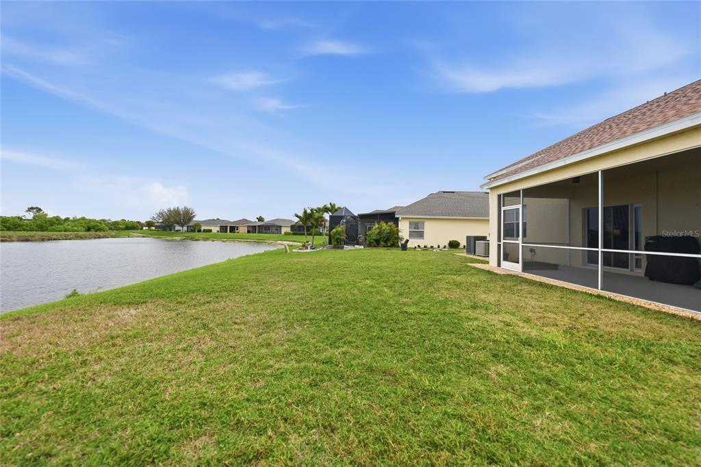 5221 Layton Drive Venice, FL 34293 - Photo 33 of 33 a view of a garden with an outdoor space and seating area