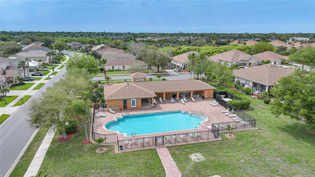 5221 Layton Drive Venice, FL 34293 - Photo 6 of 33 an aerial view of a house with a garden