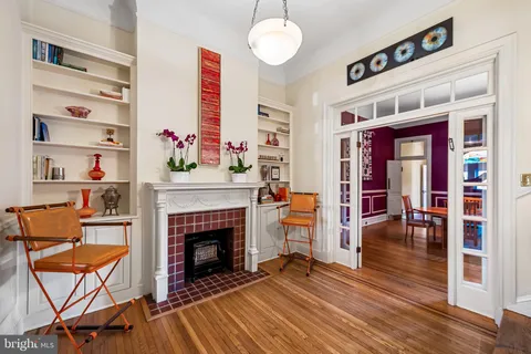 a kitchen with stainless steel appliances granite countertop a stove and cabinets