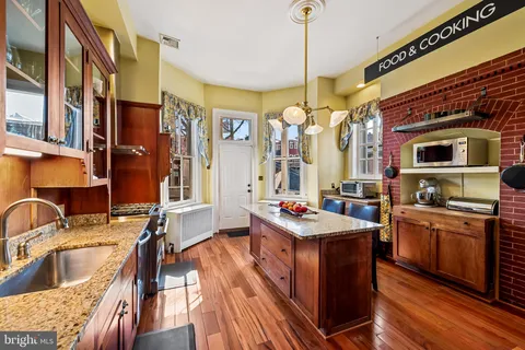 a living room with furniture fireplace and flat screen tv