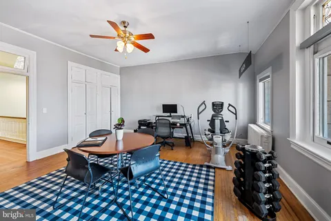 an aerial view of residential houses with city view