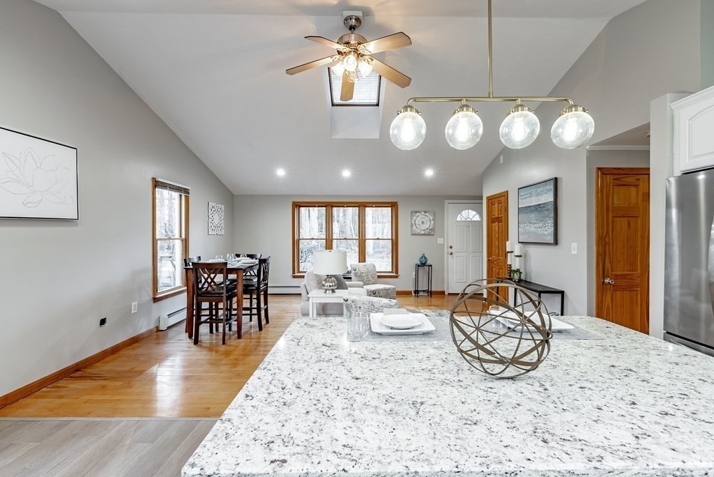 209 Freeman Road Charlton, MA 01507 - Photo 12 of 30 a view of a dining room with furniture window and wooden floor