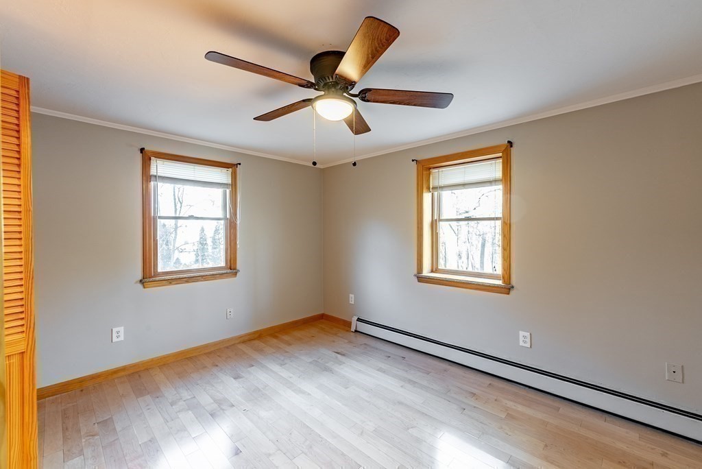 209 Freeman Road Charlton, MA 01507 - Photo 18 of 30 a view of an empty room with a window