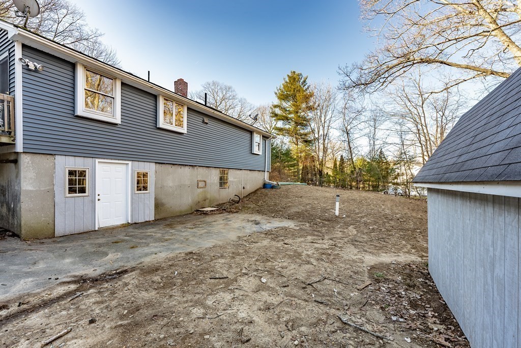 209 Freeman Road Charlton, MA 01507 - Photo 28 of 30 a view of a house with a yard
