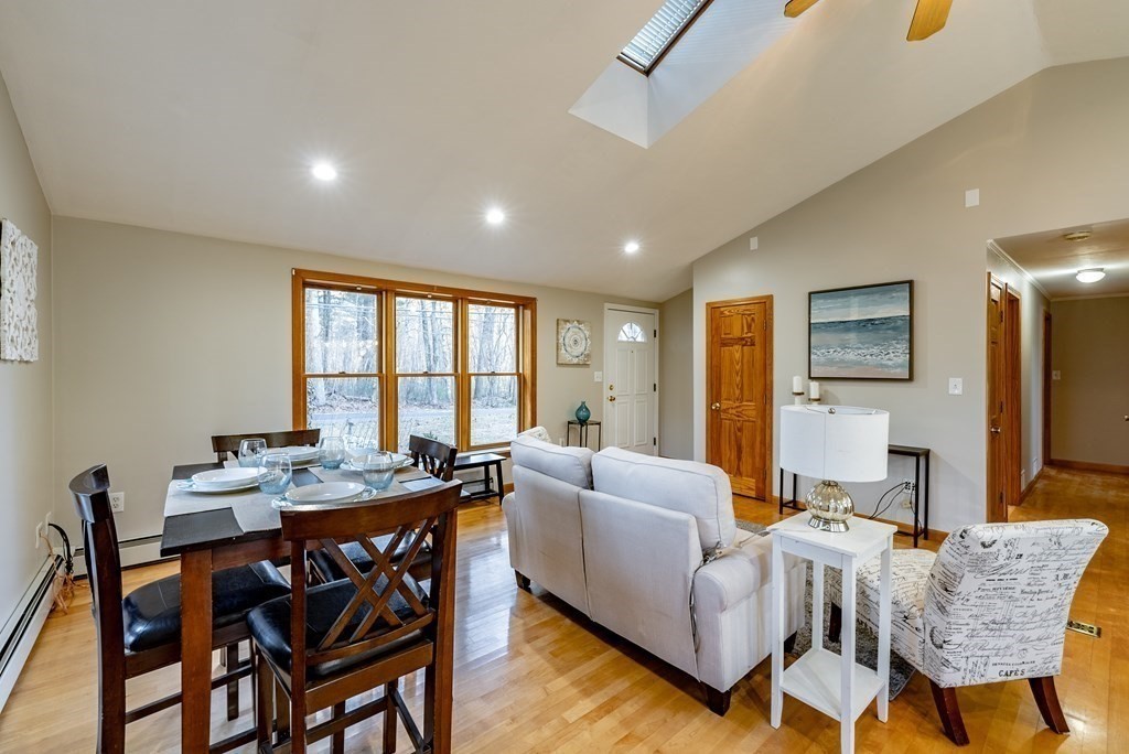 209 Freeman Road Charlton, MA 01507 - Photo 5 of 30 a living room with furniture and a flat screen tv