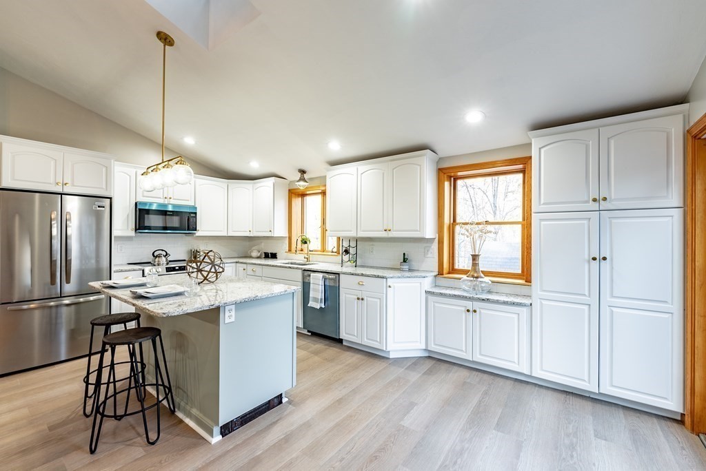209 Freeman Road Charlton, MA 01507 - Photo 7 of 30 a kitchen with sink cabinets and refrigerator