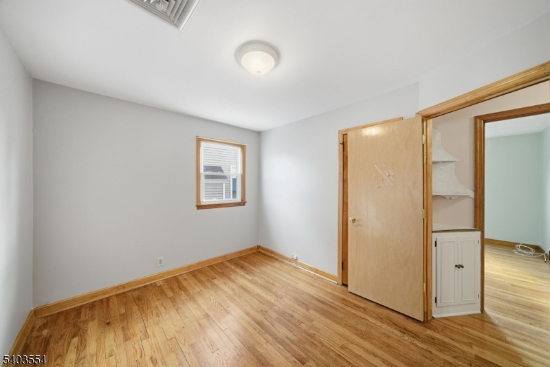 52 Broadway Clark, NJ 07066 - Photo 15 of 47 a view of empty room with wooden floor
