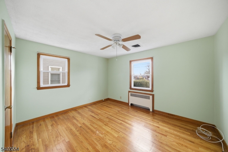 52 Broadway Clark, NJ 07066 - Photo 19 of 47 a view of room with window and ceiling fan