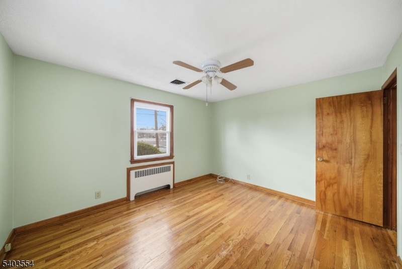 52 Broadway Clark, NJ 07066 - Photo 22 of 47 wooden floor in an empty room