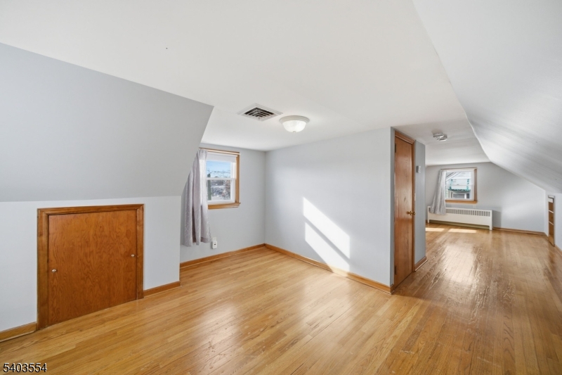 52 Broadway Clark, NJ 07066 - Photo 31 of 47 a view of empty room with wooden floor