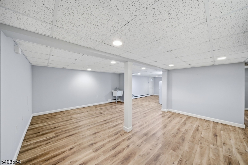 52 Broadway Clark, NJ 07066 - Photo 35 of 47 a view of empty room with wooden floor