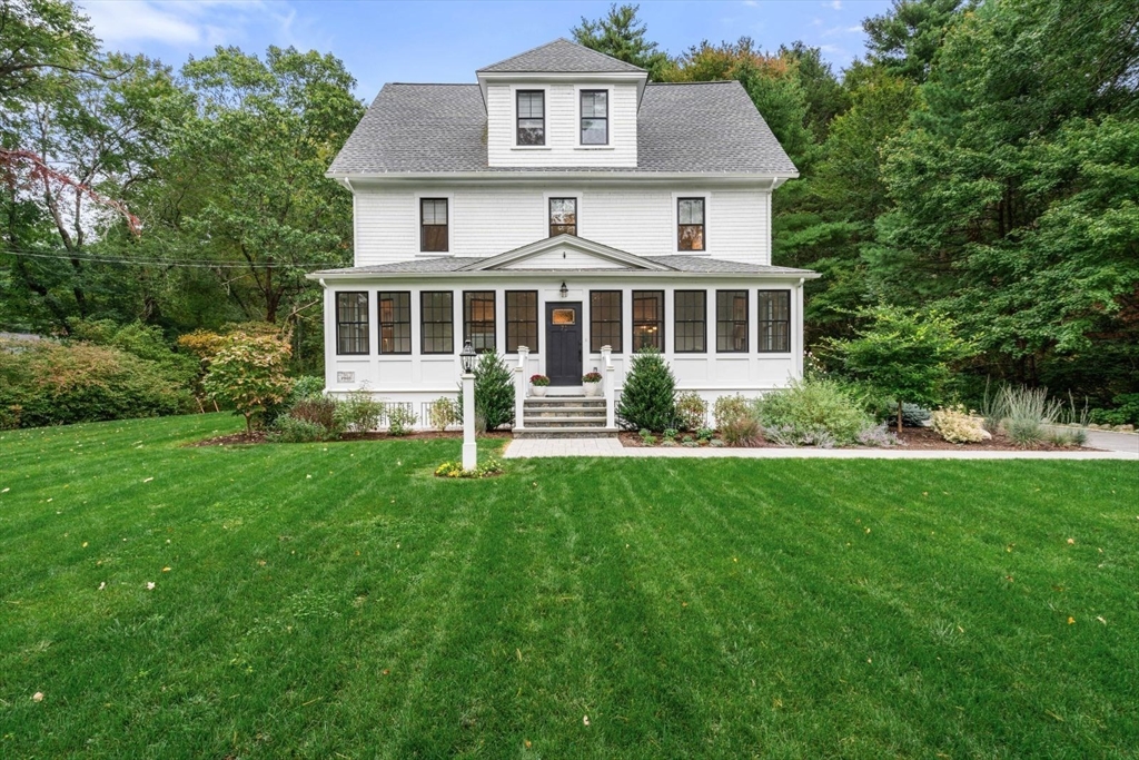 71 Concord Road Weston, MA 02493 - Photo 1 of 42 a front view of a house with a yard