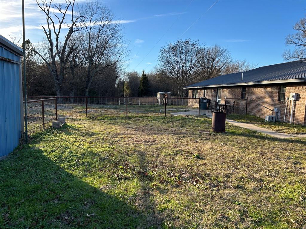 770 Rains County Road 3060 Emory, TX 75440 - Photo 15 of 39 a backyard of a house with lots of green space