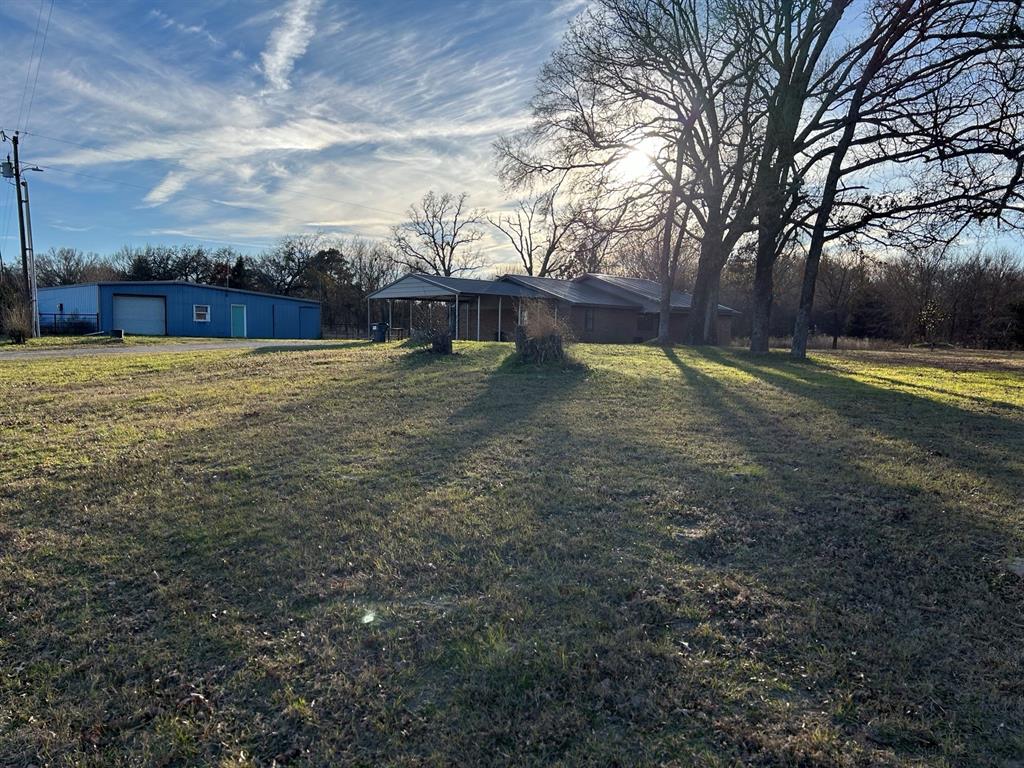 770 Rains County Road 3060 Emory, TX 75440 - Photo 7 of 39 a backyard of a house with lots of green space