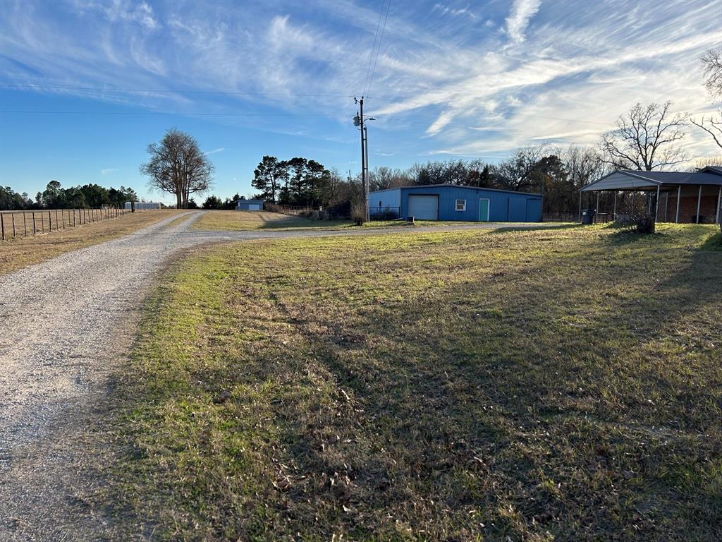 770 Rains County Road 3060 Emory, TX 75440 - Photo 8 of 39 a view of a house with a yard