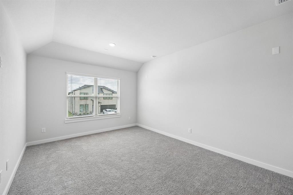 1469 Companero Street Haslet, TX 76052 - Photo 23 of 36 an empty room with windows
