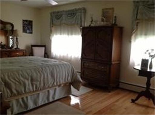 39 Ashmore Road Worcester, MA 01602 - Photo 13 of 24 a bedroom with a bed and a window