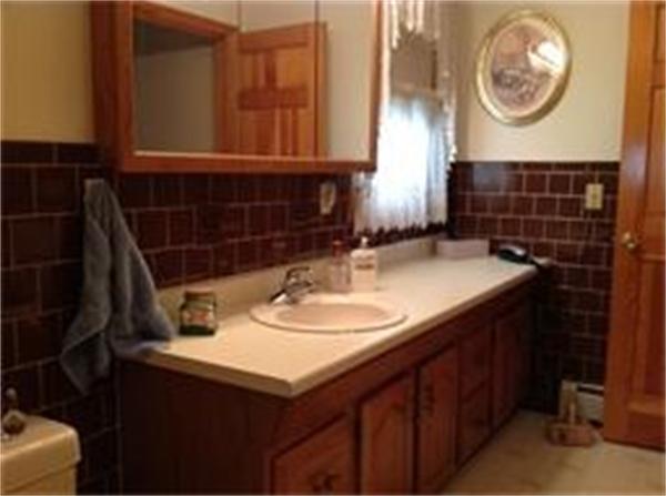 39 Ashmore Road Worcester, MA 01602 - Photo 24 of 24 a bathroom with a sink and a mirror