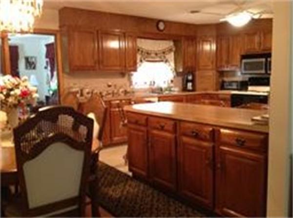 39 Ashmore Road Worcester, MA 01602 - Photo 9 of 24 a kitchen with a sink and cabinets