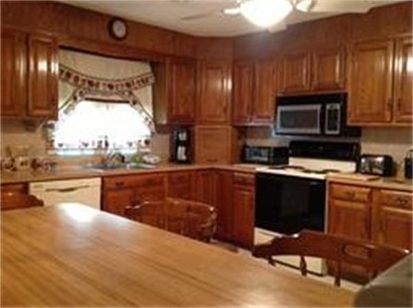 39 Ashmore Road Worcester, MA 01602 - Photo 10 of 24 a kitchen with a sink cabinets and window