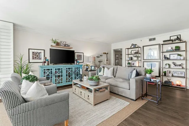 a kitchen with stainless steel appliances a refrigerator and a stove top oven