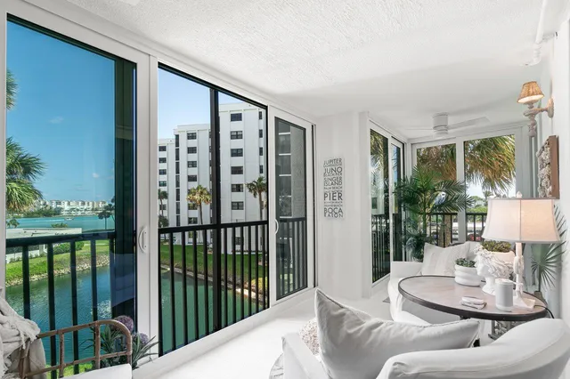 an aerial view of a city with lake view