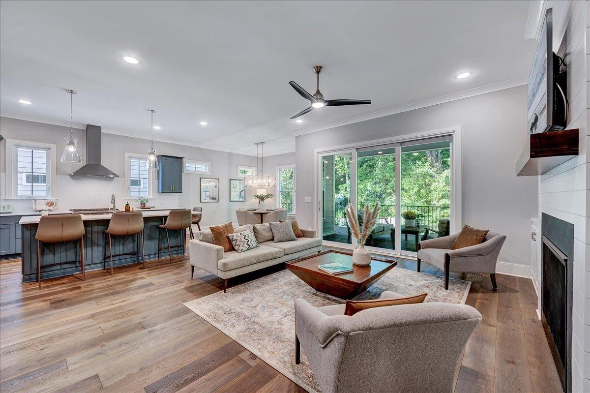 3065 Eden Harbor Court Raleigh, NC 27613 - Photo 23 of 40 a living room with furniture and a large window
