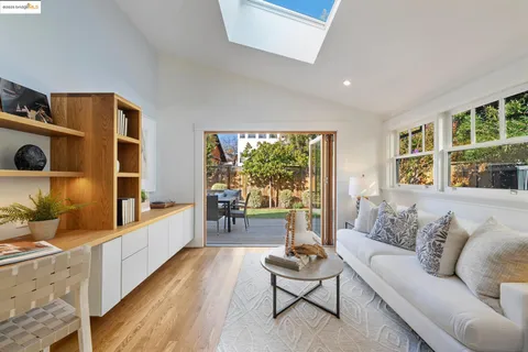 a living room with couch and a window