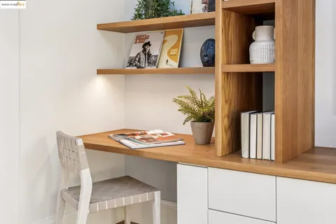 a view of bathroom with washer and dryer