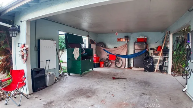 a view of livingroom with furniture and floor to ceiling window