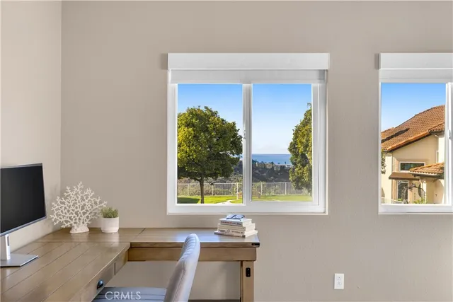 a white toilet sitting next to a shower