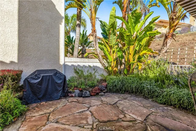 a swimming pool with outdoor seating