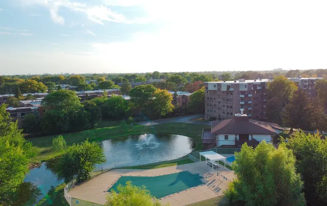 a view of a lake with a yard