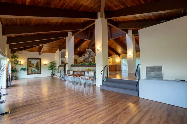 a view of a porch and garden