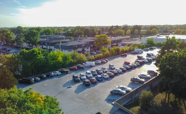 a view of a garden and mountains