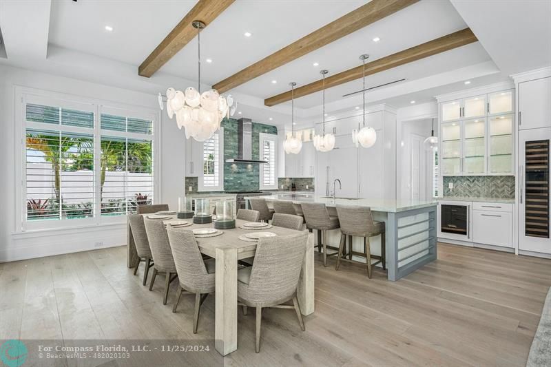 1122 Miramar Drive Delray Beach, FL 33483 - Photo 13 of 44 a view of a dining room with furniture window and wooden floor