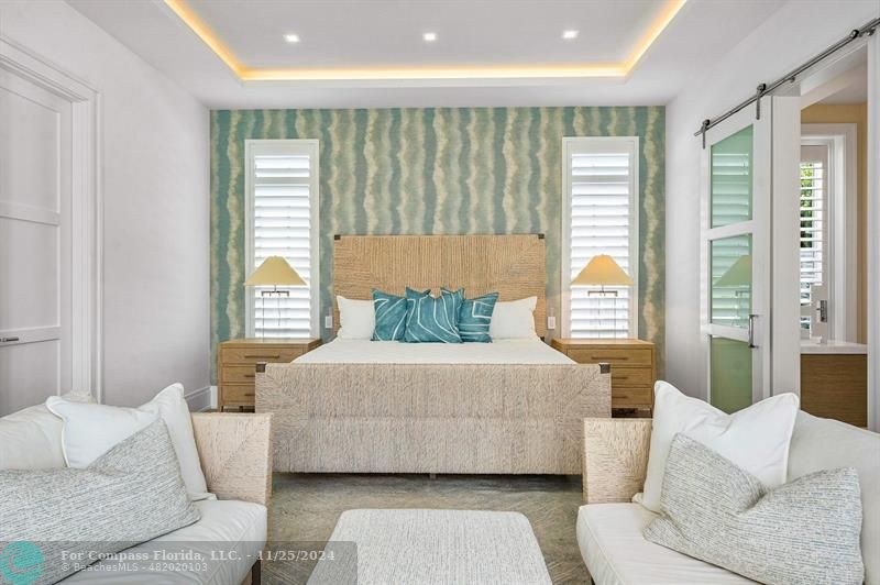 1122 Miramar Drive Delray Beach, FL 33483 - Photo 19 of 44 a bedroom with a bed and a couch