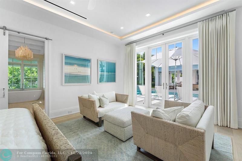 1122 Miramar Drive Delray Beach, FL 33483 - Photo 20 of 44 a living room with furniture and a large window